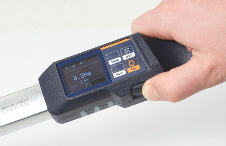 전자 토크/회전 각도 렌치, 플러그인 래칫 포함 (“TWdrive” electronic torque/rotational angle wrench with plug-in ratchet)